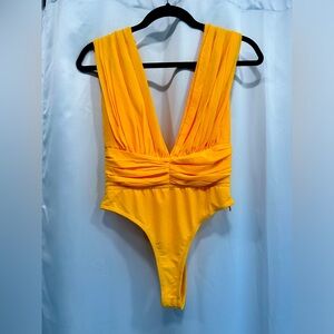Skylar rose yellow bodysuit size small